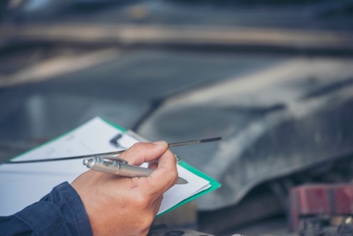 The extent of damage to the vehicle is assessed by the mechanic