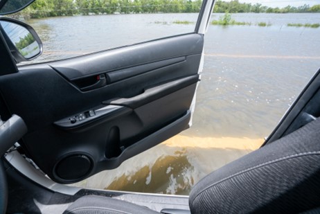 Car is parked on flooded streets